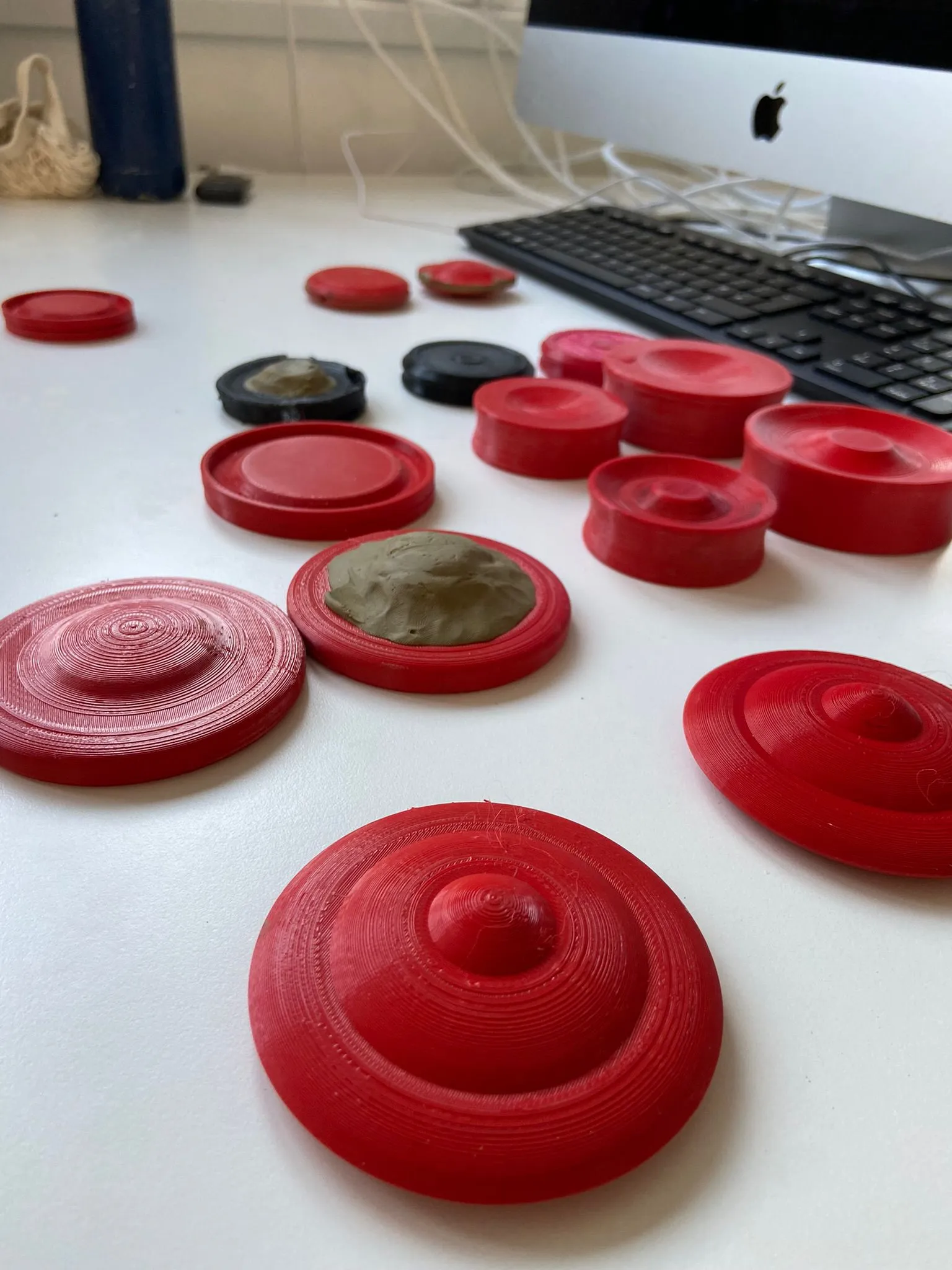 THUDPUK PLA prototypes — discus-form variations testing aerodynamic profiles